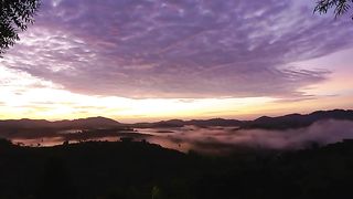 Sunrise Over Mountains And Fog
