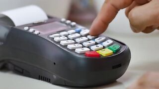 Swiping A Credit Card On A Machine
