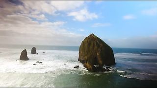 Drone Footage Over Cannon Beach With Haystack Rock