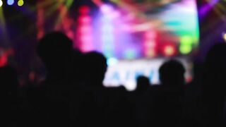 Defocused Silhouettes In A Concert