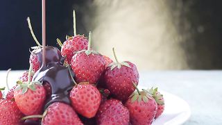 Fresh Strawberries With Pouring Melt Chocolate