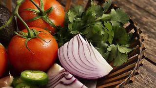 Rotating Shot Of Beautiful, Fresh Vegetables On A Wooden Surface