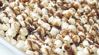 Pouring Caramel Melts Down On Mushroom Popcorn