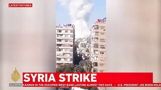 Syrian state media is reporting that a strike has hit a residential building
