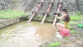 Girl Fishing. Amazingly Big Fish Hunting At The Sewer.