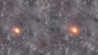 Ukrainian drones drop bombs on unsuspecting Russian soldiers in frozen trenches