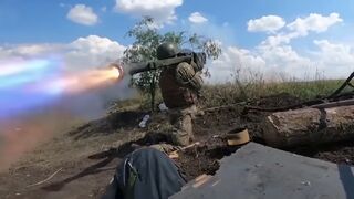 Ukrainian soldiers fire anti-aircraft weapons to shoot down Russian drones