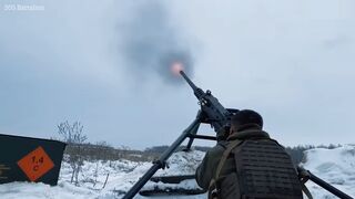 Ukrainian troops fire mortars and machine guns at Russian aerial targets