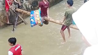 pillow hitting contest on the water