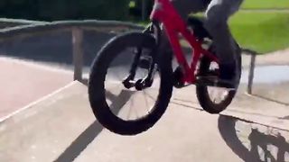 4yr old wrecks a bike wheel ????