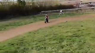 Riding motocross on a PW50 - 3 year old learning to jump!