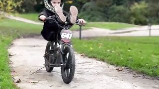 Stunt riding 5 year old learning bike tricks!