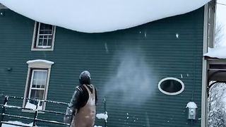 Unsuccessful attempts to knock snow off the roof
