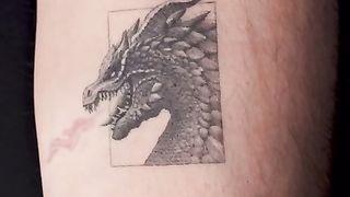 Tattoo ink that appears under ultraviolet light