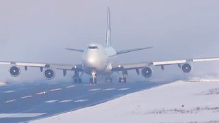 ❄️WONDERFULL LIEGE❄️  Aslairlinesfrance Boeing 747-400F thundering down the runway kicking up HUGE amounts of snow????????