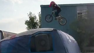 4yr old does BMX trains with @BmxCaiden on the airbag!!