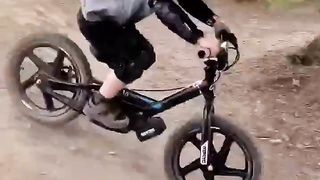 Ebike stunt riding toddler having fun riding his bike in the dirt ????