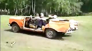 Youngsters ride on a collapsed Muscovite
