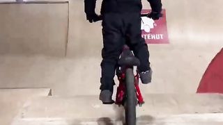 Riding down a HUGE roll in to BMX jump box？ At 4？!!