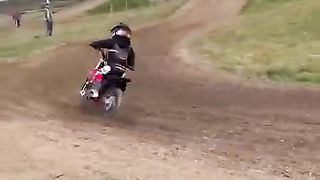 Learning to jump a motocross bike - 3 year old rider on an electric MX bike!