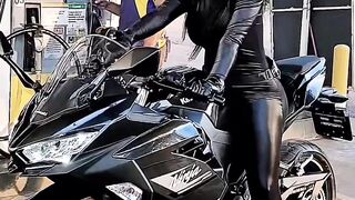 Wow. Black kitty on a motorcycle