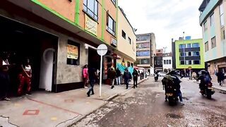 Santa Fe neighborhood a community where people feel alone together Bogota Colombia