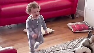 Baby making fun with a pet ????