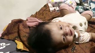 A baby learn talking