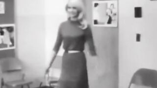 School boys react to their attractive new teacher, 1965