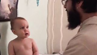 cute baby trying t sing