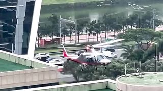 Landing and taking off of an Agusta on the elevated helipoint SJEB, Vila Olímpia, São Paulo.