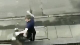 Knock Out Punch Makes Thief Face Plant Into Brick Wall