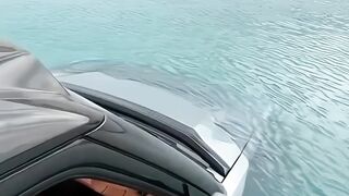 CHINESE EV MAKER SHOWS OFF ITS $ 160,000 SUV'S CAPABILITIES BY TAKING IT 'SWIMMING'