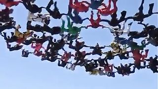 In a large skydiving formation with 101 people, they must break off strategically for proper parachute deployment