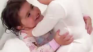 Heartwarming moment babies enjoy playing with their sibling