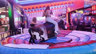 Midnight mechanical bull riding