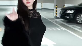 Can you help me see what those two people behind are doing