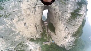 In 2011, GoPro filmed Jeb Corliss gliding through Tianmen Cave using a wing suit.