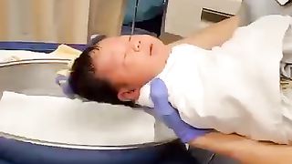Cute expression of a baby at bath time