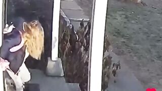 Mother of the year protects her daughter from raccoon.