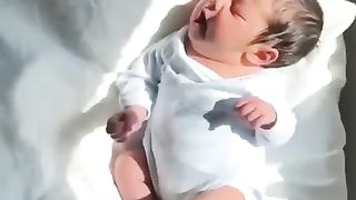 The baby wakes up in the morning