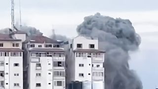 Gaza towers collapse after explosion.