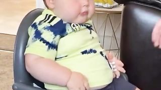 Nooo, he's not overweight! The chair is just too small!