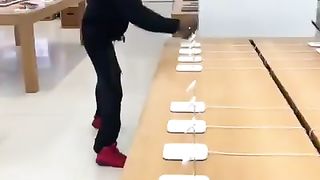 Stealing multiple IPhones in broad daylight.