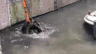 Finding some surprises while cleaning the canals of Amsterdam.