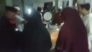 Enjoying Uduk Rice After Istigosah Event