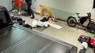 Guy takes on two home invaders! When they try to bail he drags one back in for more.