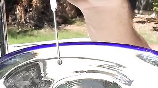 A drop of water falling in slow motion