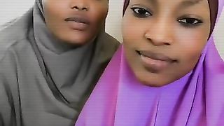 Two beautiful girls reciting Qur'an