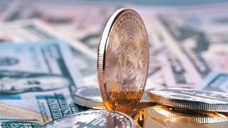 Bronze colored Bitcoin close up
